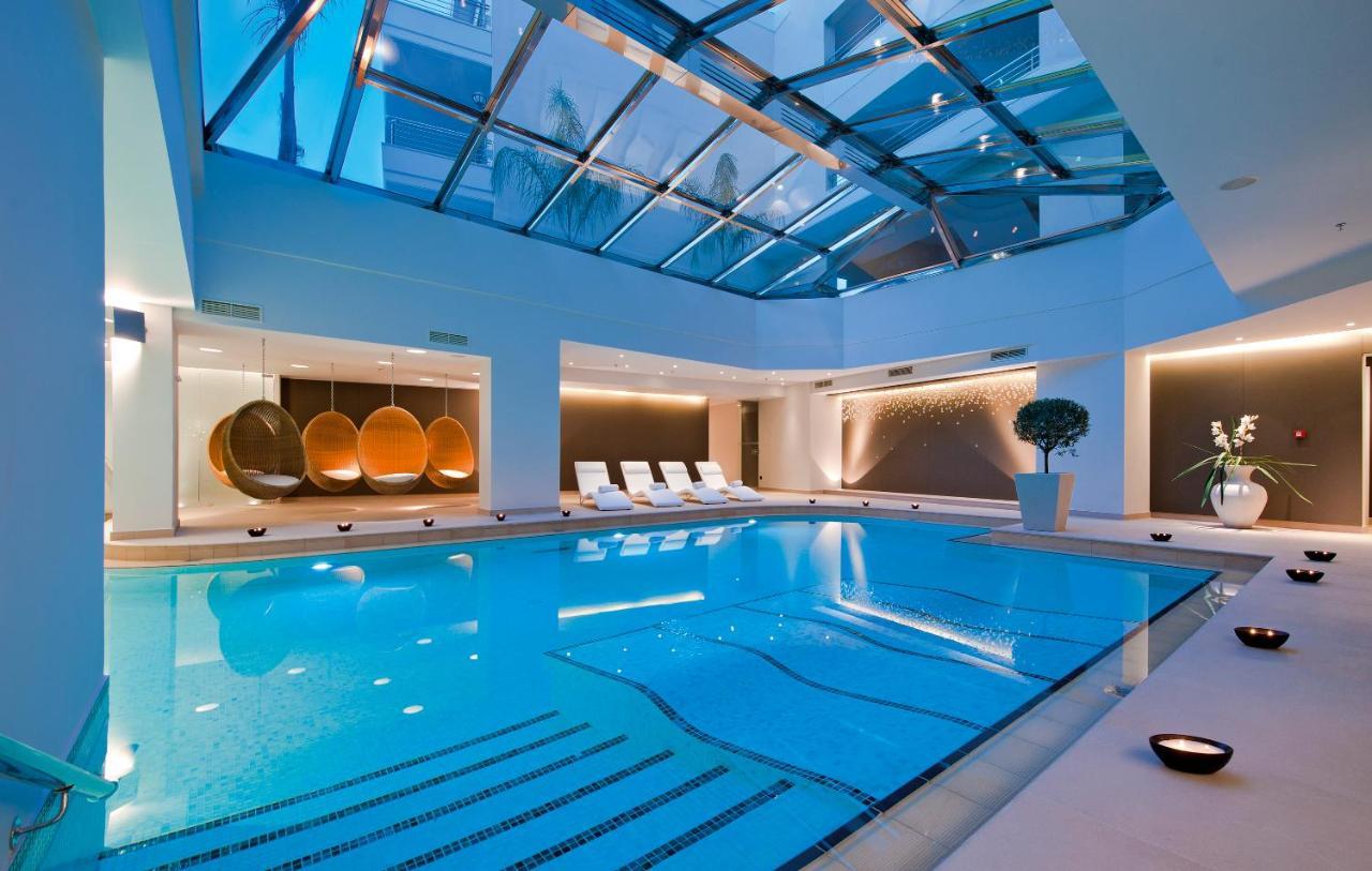 Porto Platanias Beach Resort & Spa Exterior photo The swimming pool at the hotel