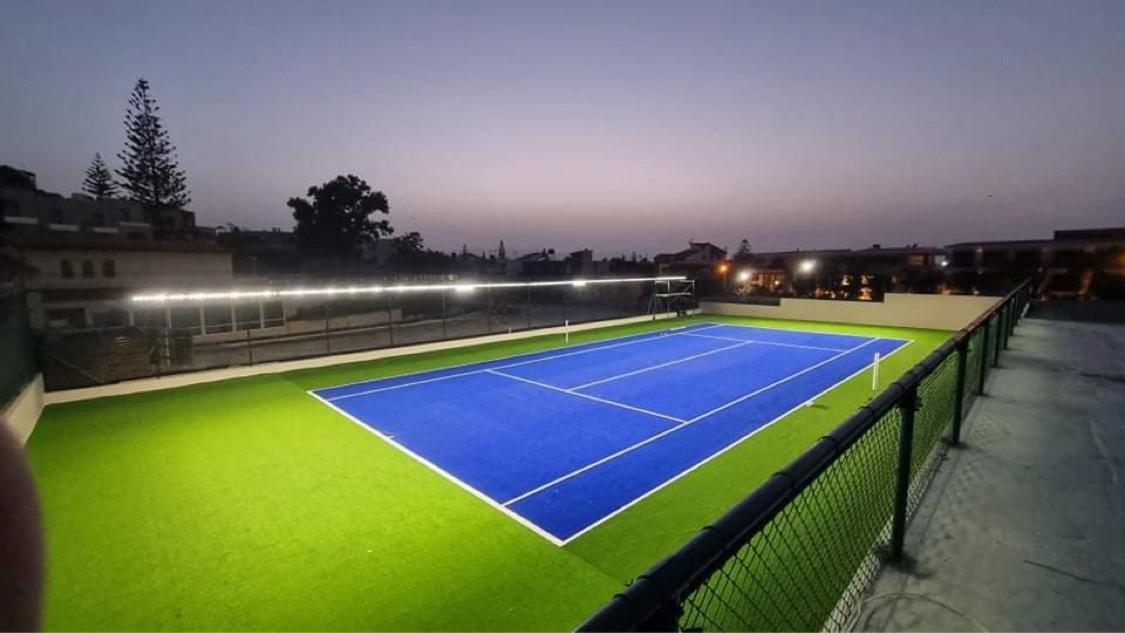 Porto Platanias Beach Resort & Spa Exterior photo Tennis court at the club