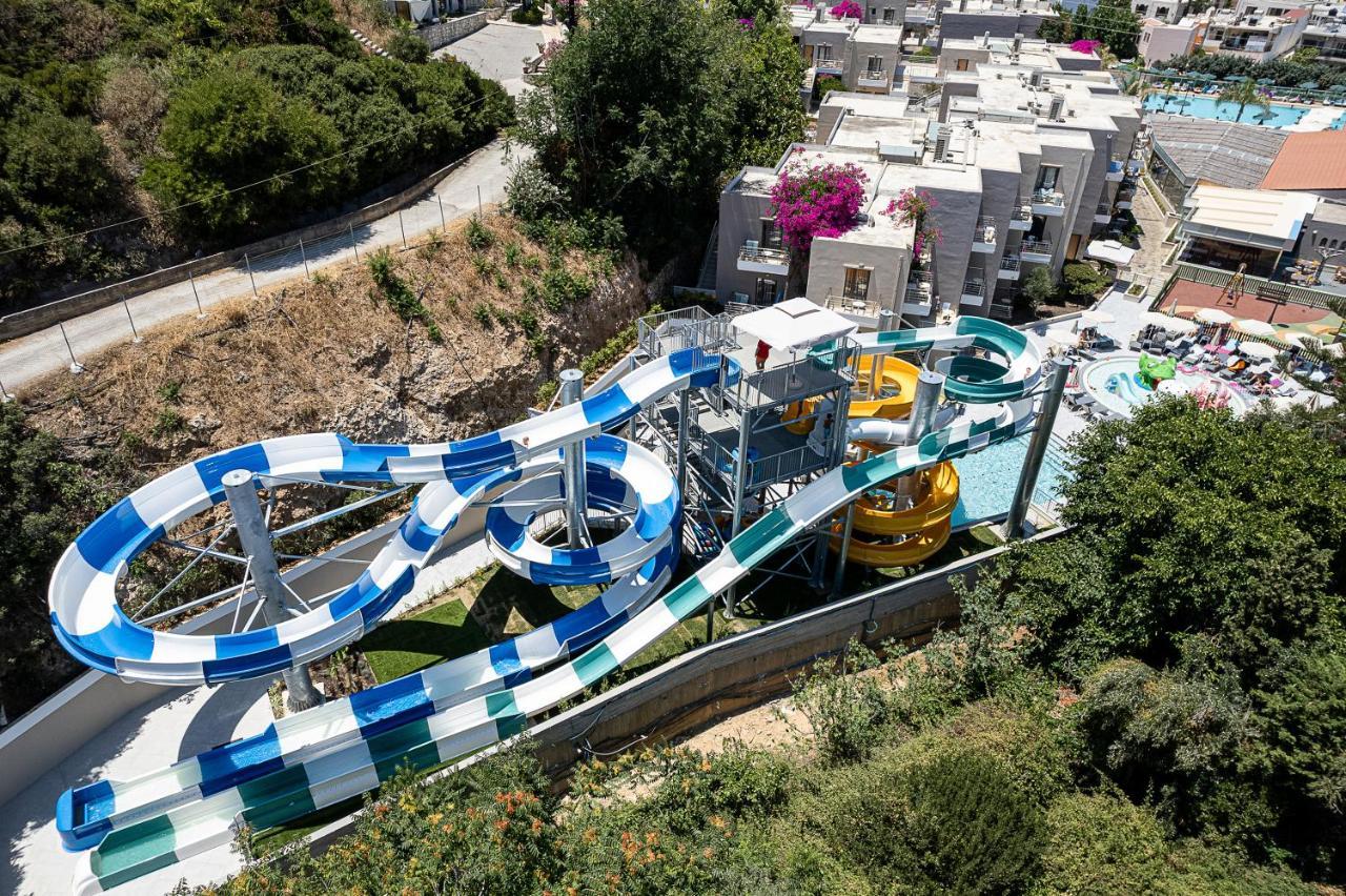 Porto Platanias Beach Resort & Spa Exterior photo Aerial view of the water park