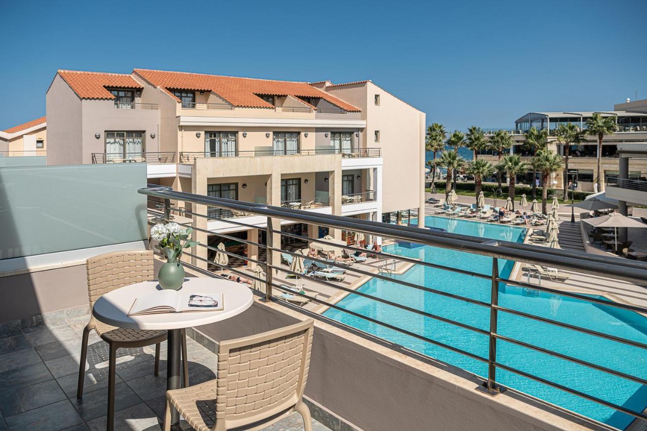 Porto Platanias Beach Resort & Spa Exterior photo A view of the pool at the hotel