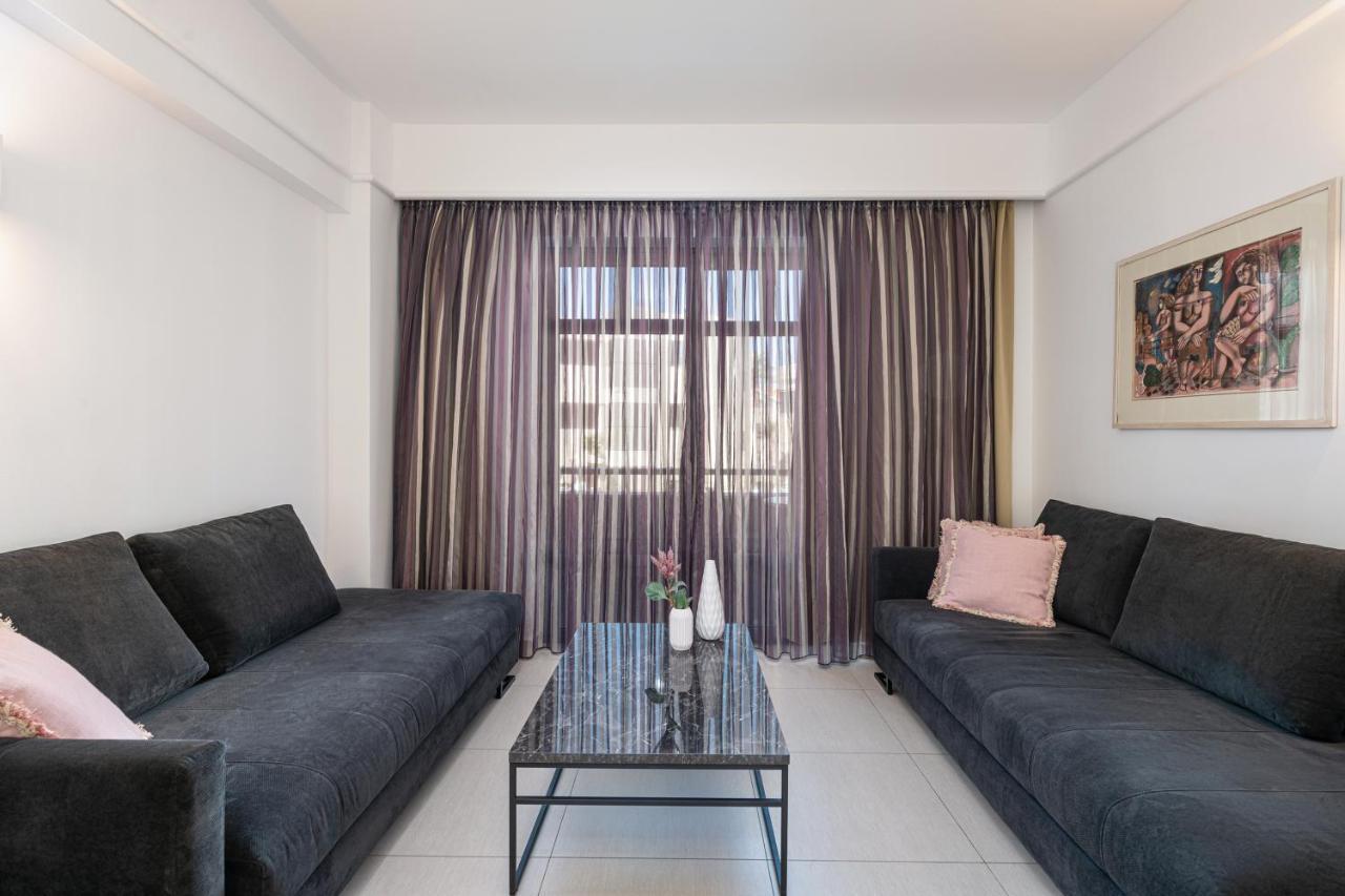 Porto Platanias Beach Resort & Spa Exterior photo A living room with a curtain
