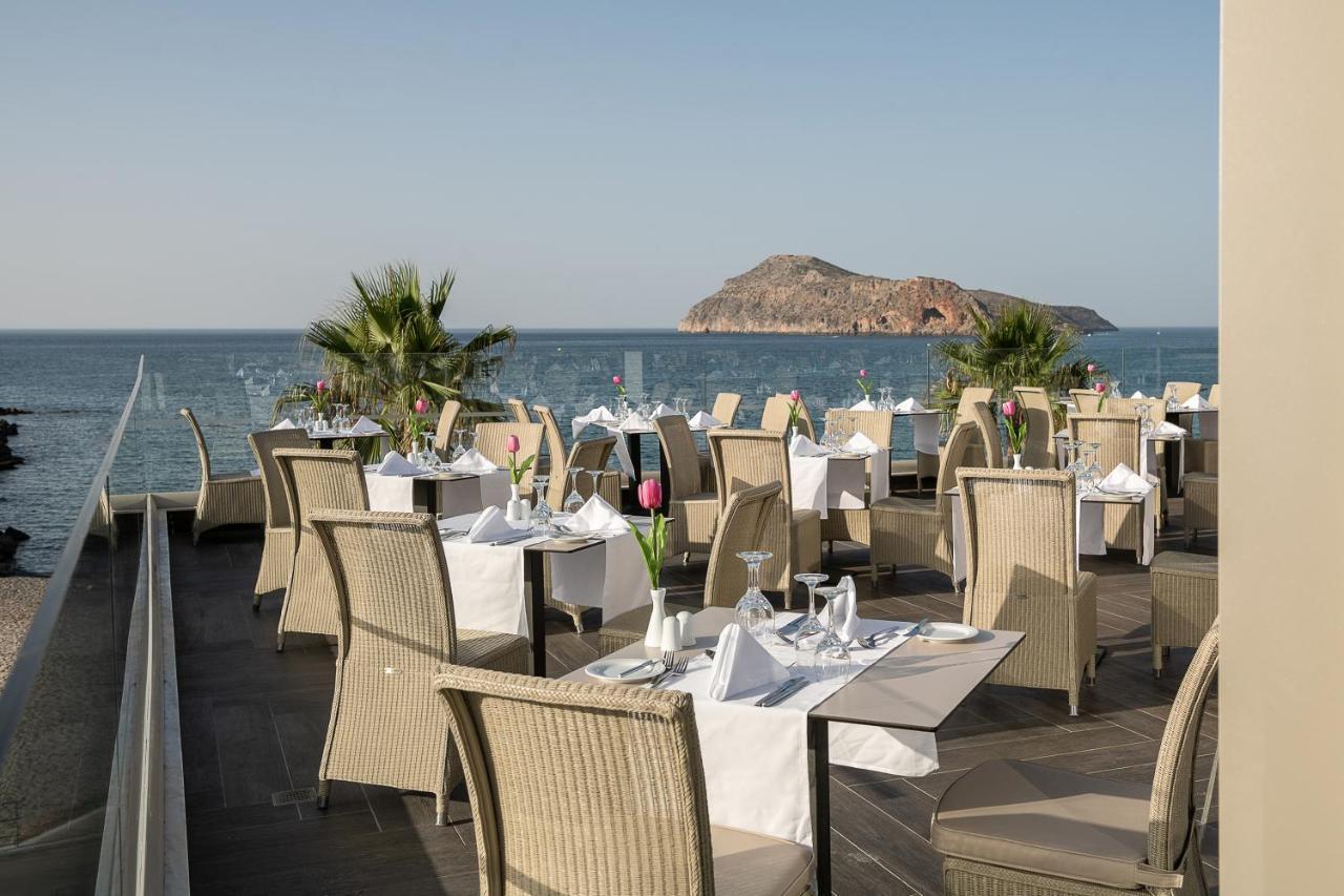 Porto Platanias Beach Resort & Spa Exterior photo The restaurant