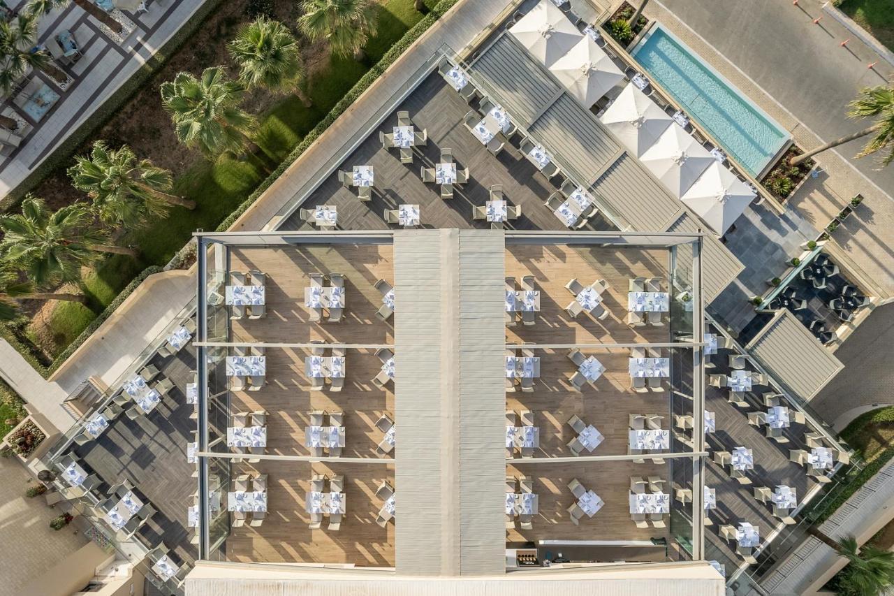 Porto Platanias Beach Resort & Spa Exterior photo The rooftop pool at the W Scottsdale