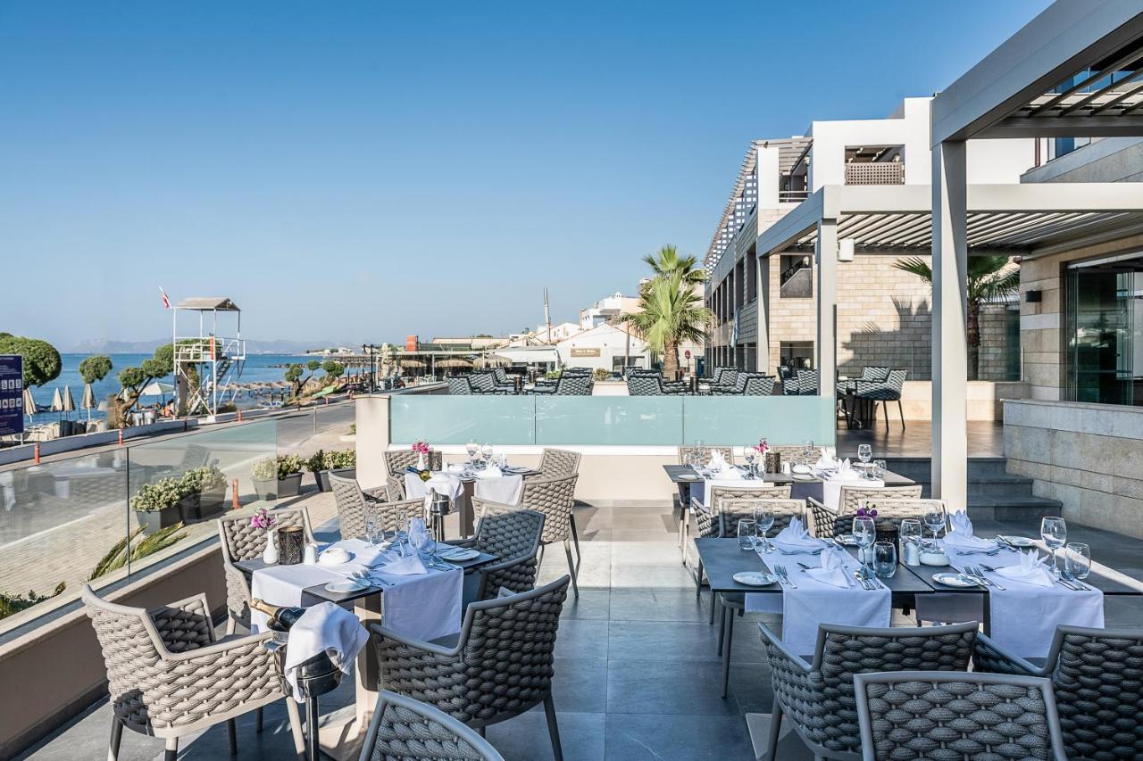 Porto Platanias Beach Resort & Spa Exterior photo The restaurant