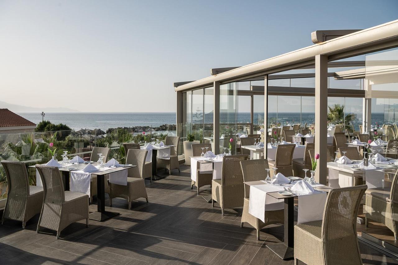 Porto Platanias Beach Resort & Spa Exterior photo The Sky Bar