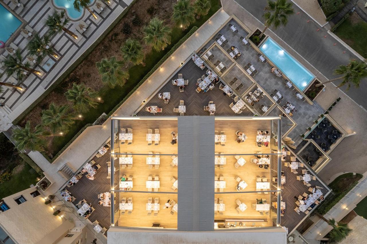 Porto Platanias Beach Resort & Spa Exterior photo Aerial view of the hotel