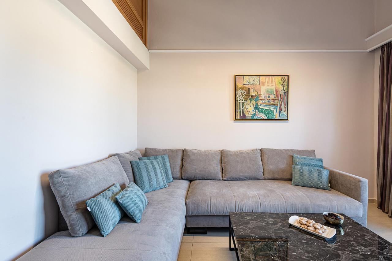 Porto Platanias Beach Resort & Spa Exterior photo A sectional sofa