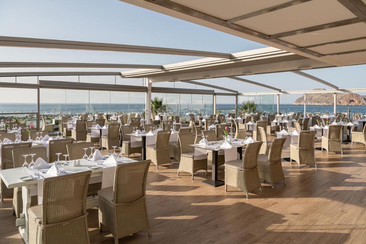Porto Platanias Beach Resort & Spa Exterior photo The restaurant