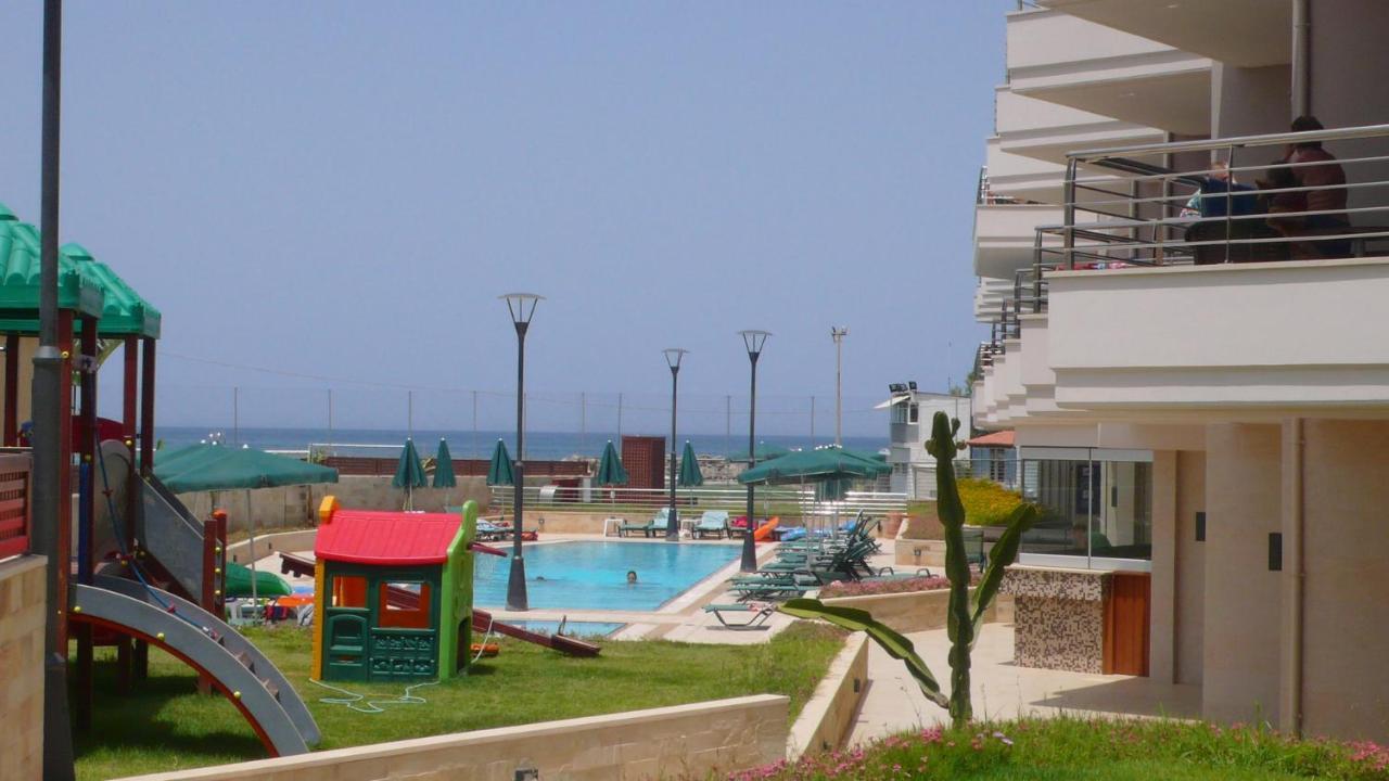 Porto Platanias Beach Resort & Spa Exterior photo A view of the beach
