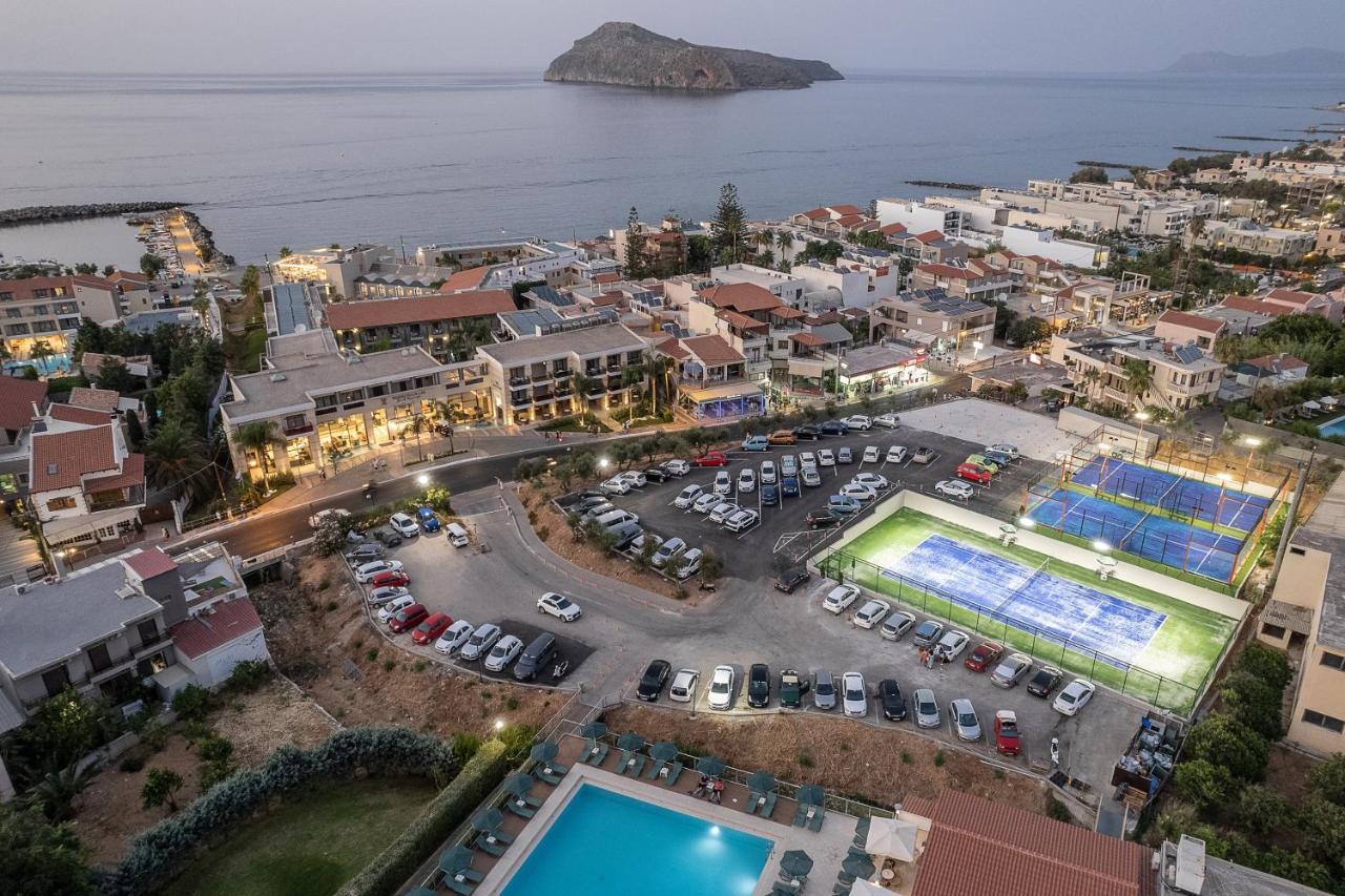 Porto Platanias Beach Resort & Spa Exterior photo Aerial view of the town
