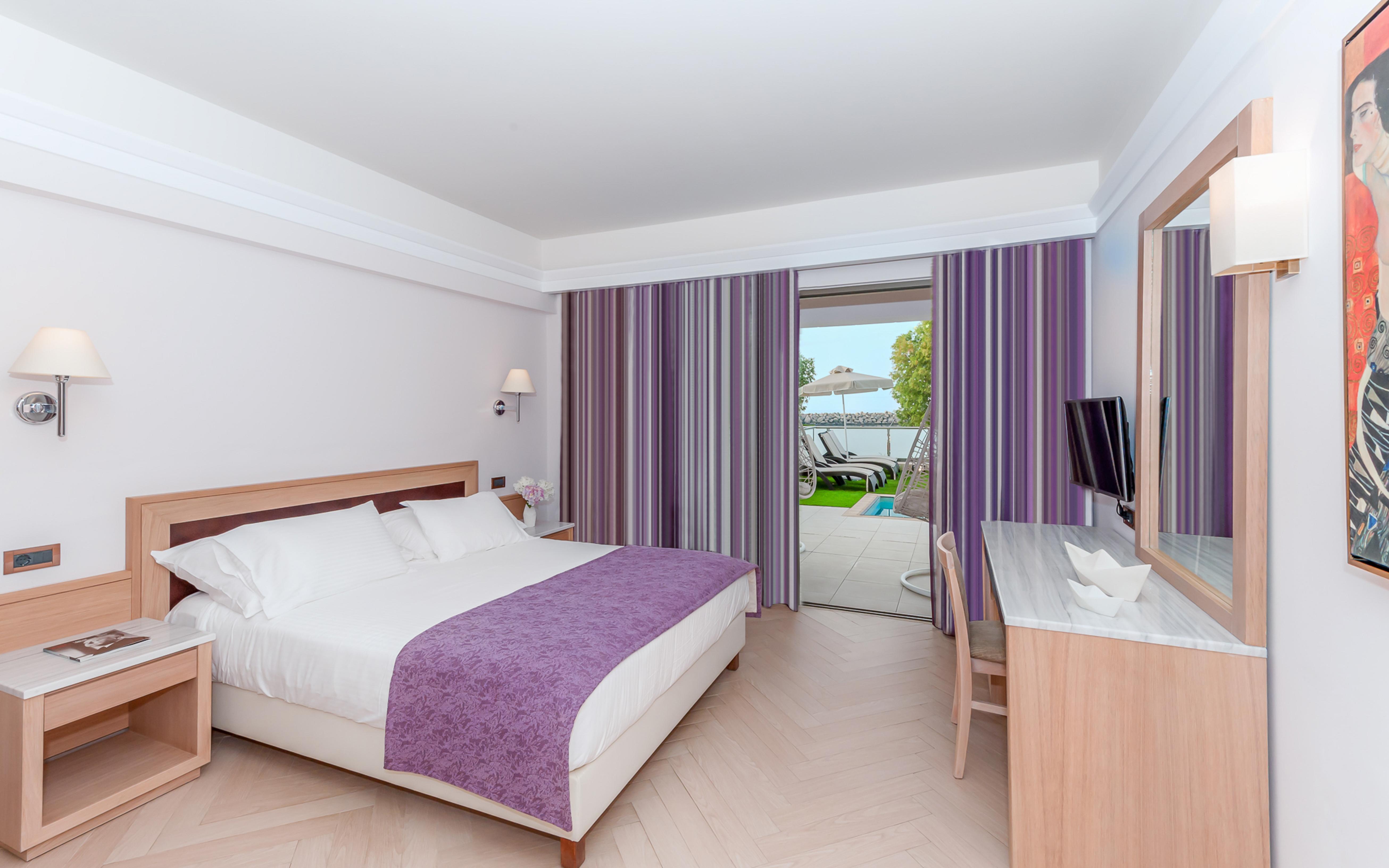 Porto Platanias Beach Resort & Spa Exterior photo A typical room at the hotel
