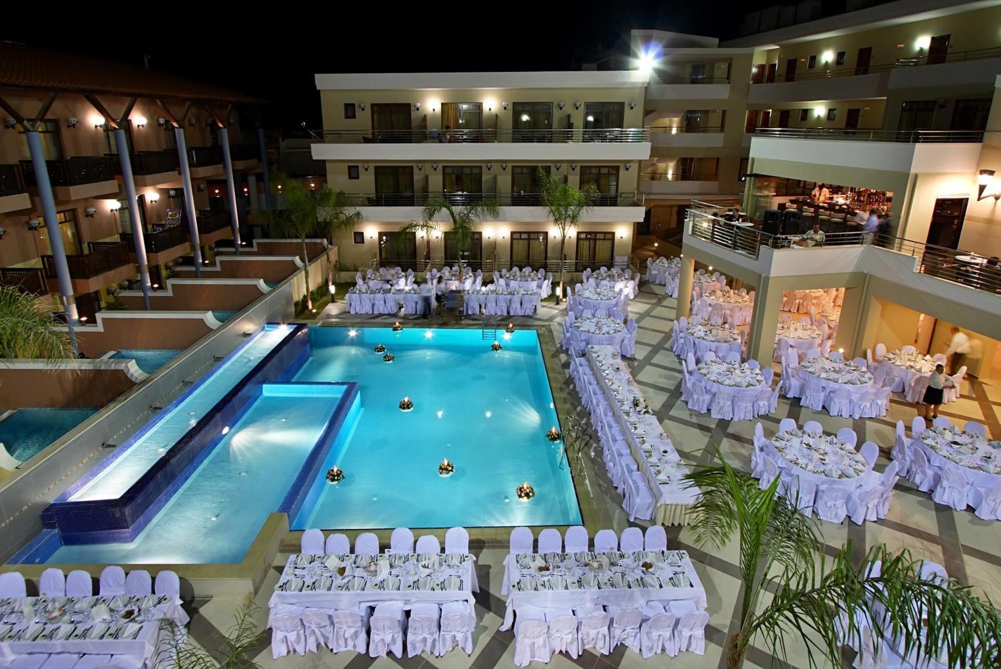 Porto Platanias Beach Resort & Spa Exterior photo The pool at the hotel